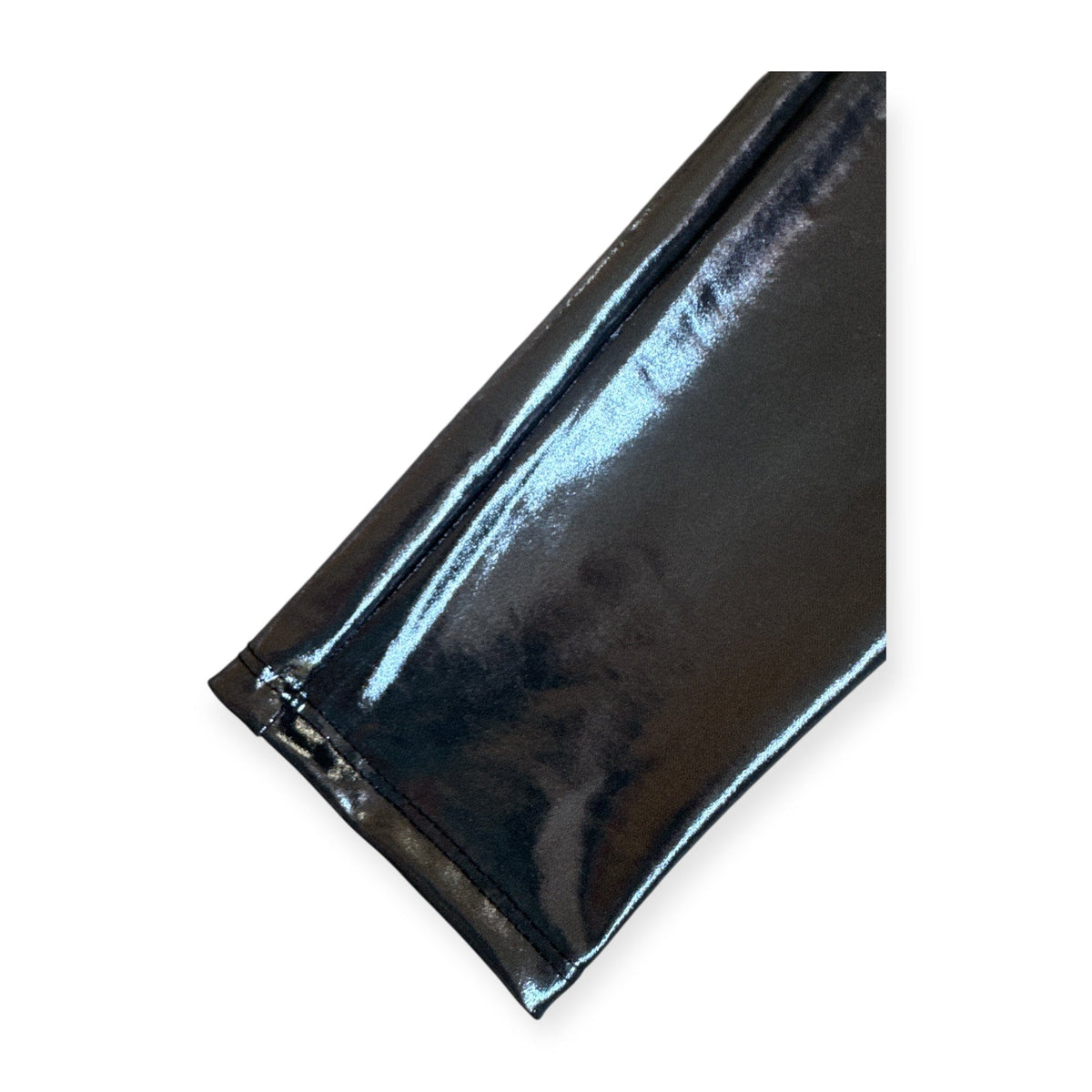 Close-up of the Midnight Metal Legging's shiny finish at the ankle
