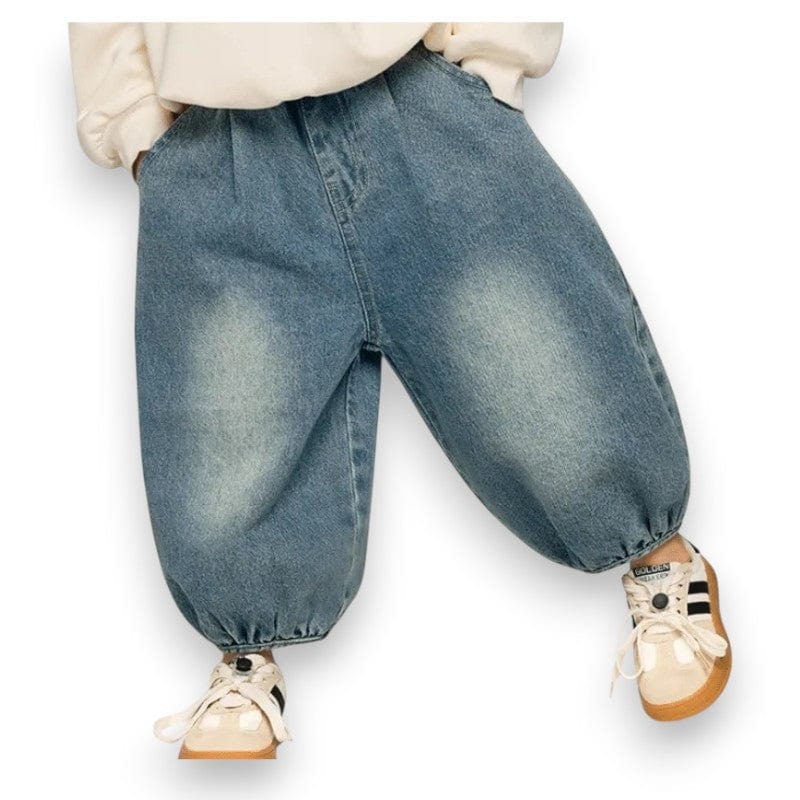 Denim Jogger worn with white sneakers, showing the balloon leg and gathered ankle