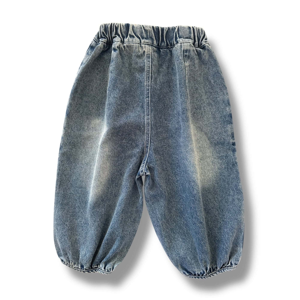 The Denim Jogger, laid flat, back view