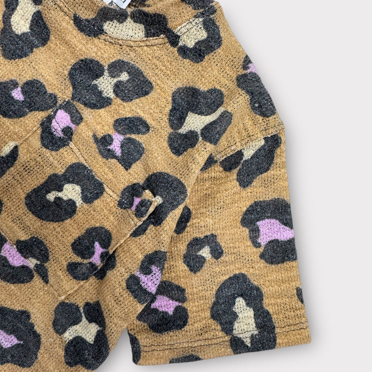 Close-up of the Lazy Leopard sweater-knit print