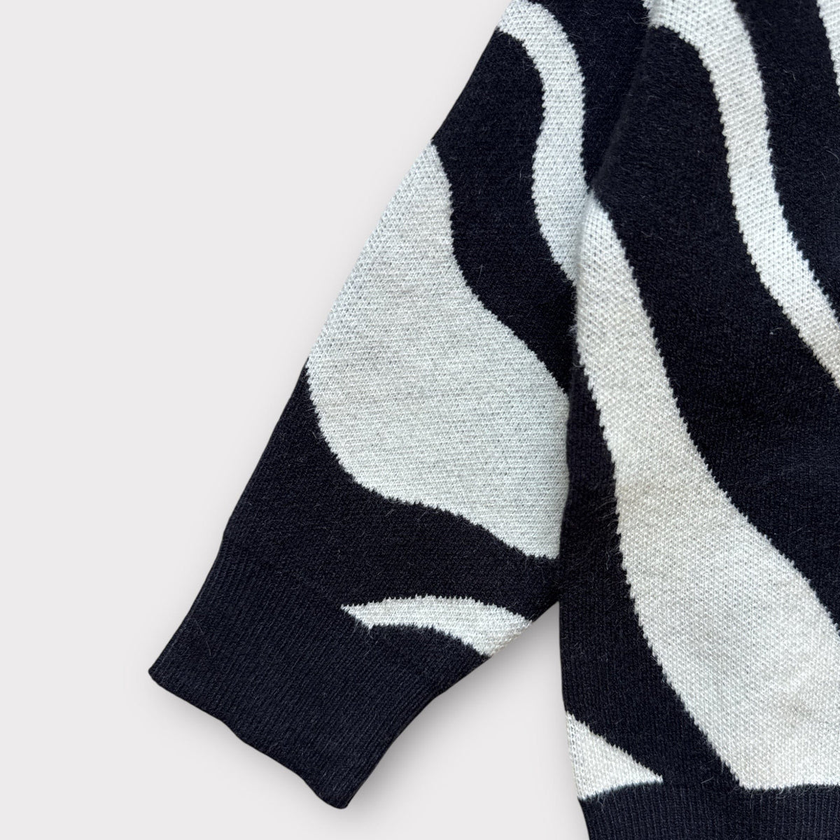 Close-up of the Trippy Tide Cardigan sleeve and cuff