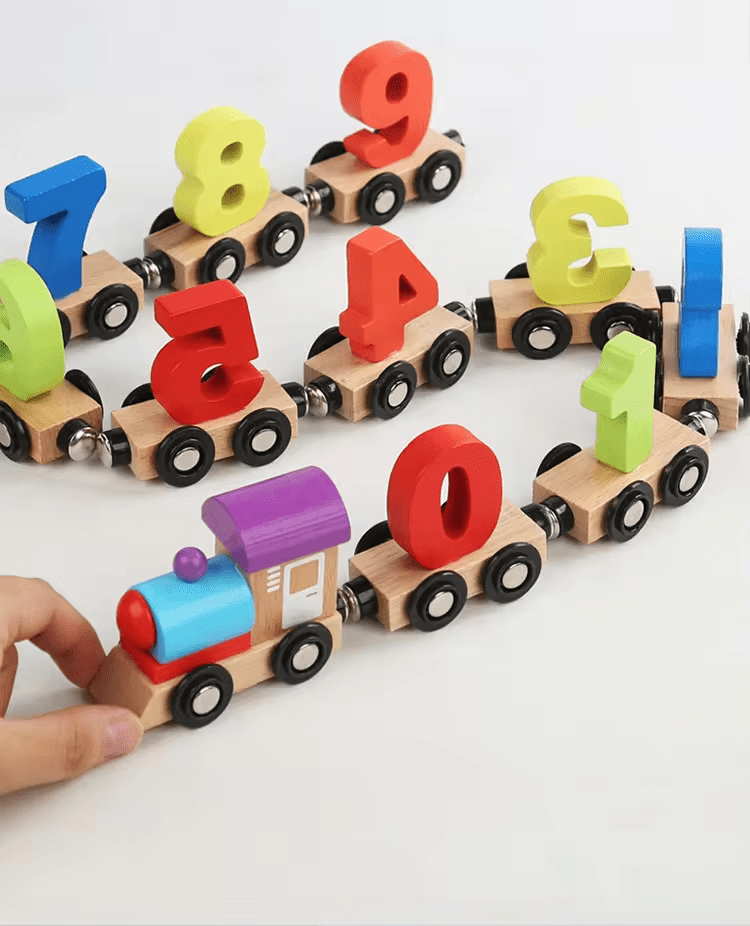 Wooden number train with magnetic number cars linked together