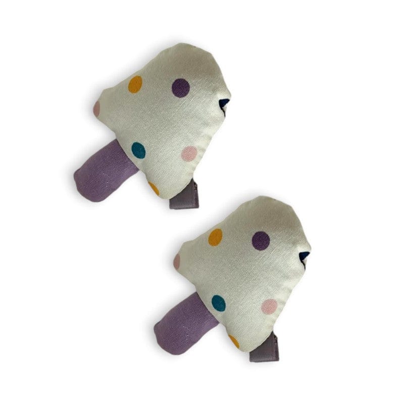 Two plush polka dot mushroom hair clips