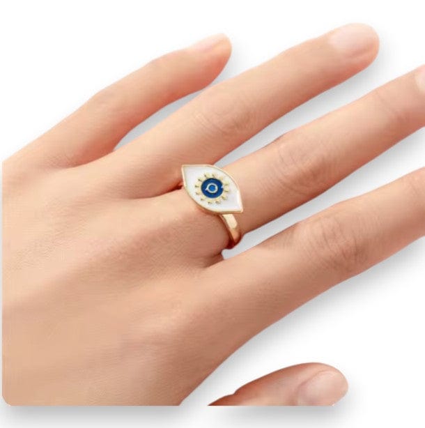 Evil eye spinner ring on a hand