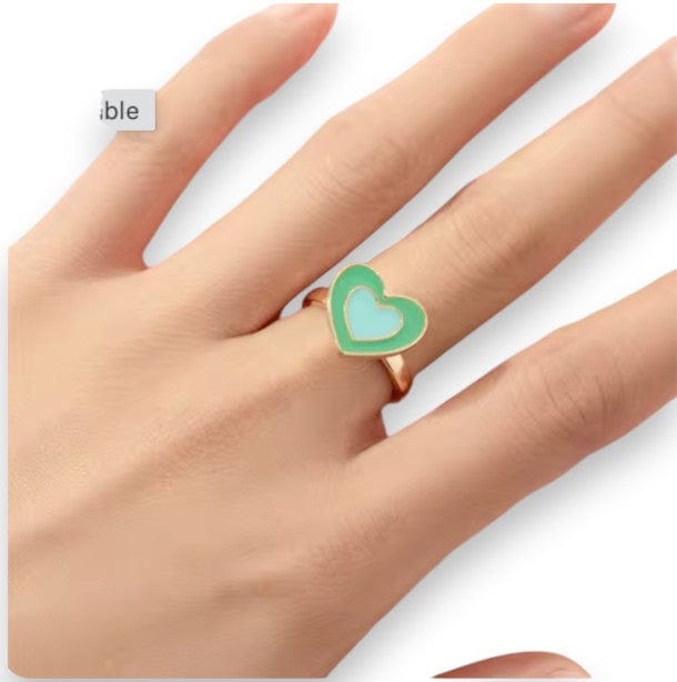 Mint green heart spinner ring