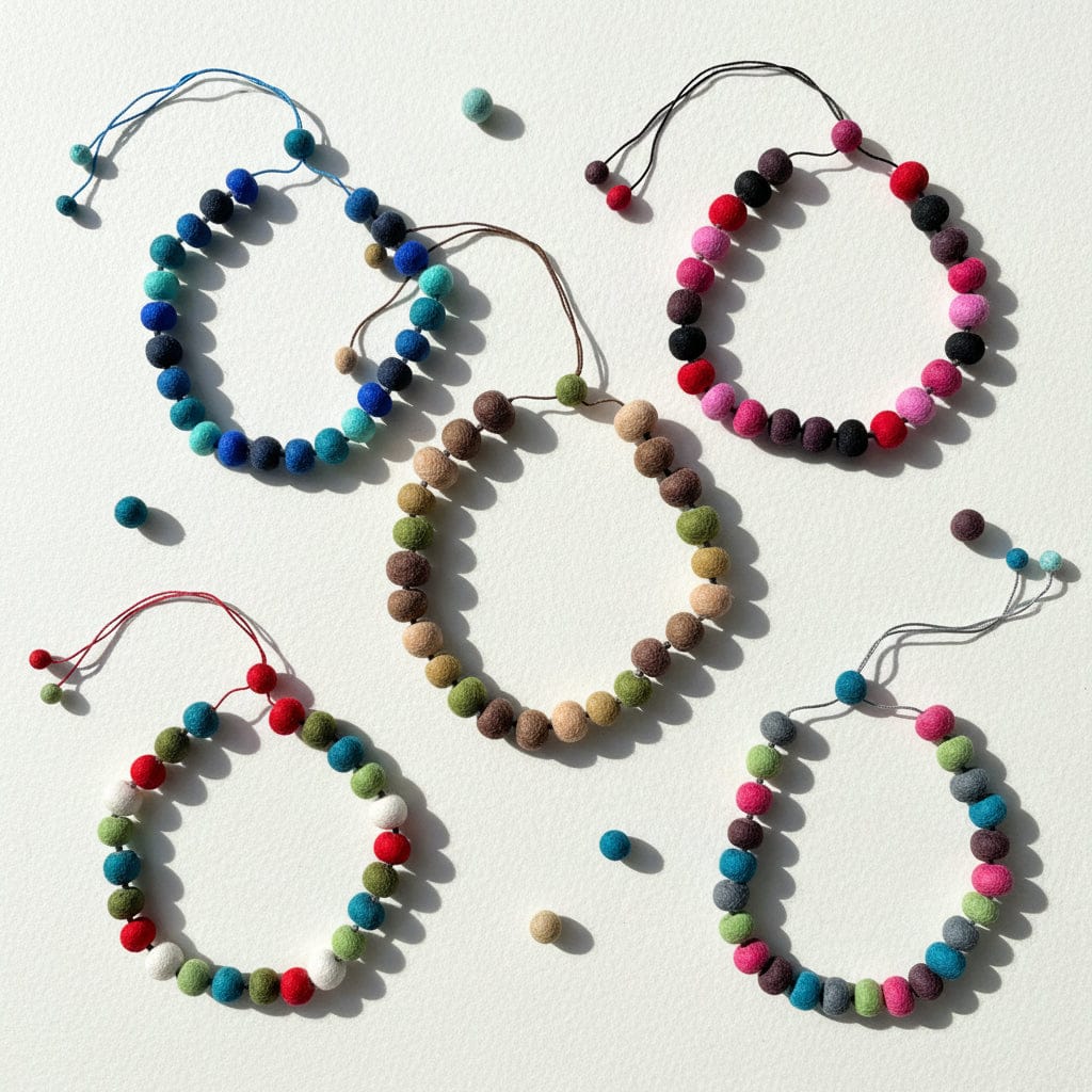 Five Woolly Wonders felt bead necklaces in assorted color mixes