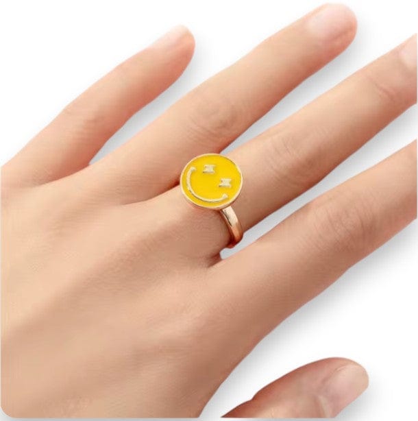 Yellow smiley face spinner ring