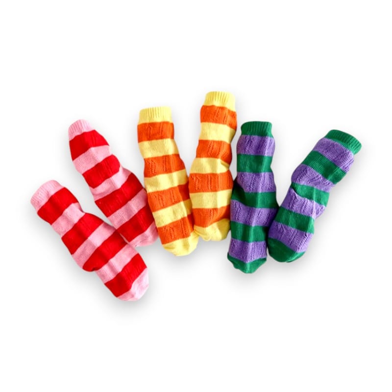 All three pairs of Happy Stripe socks laid out
