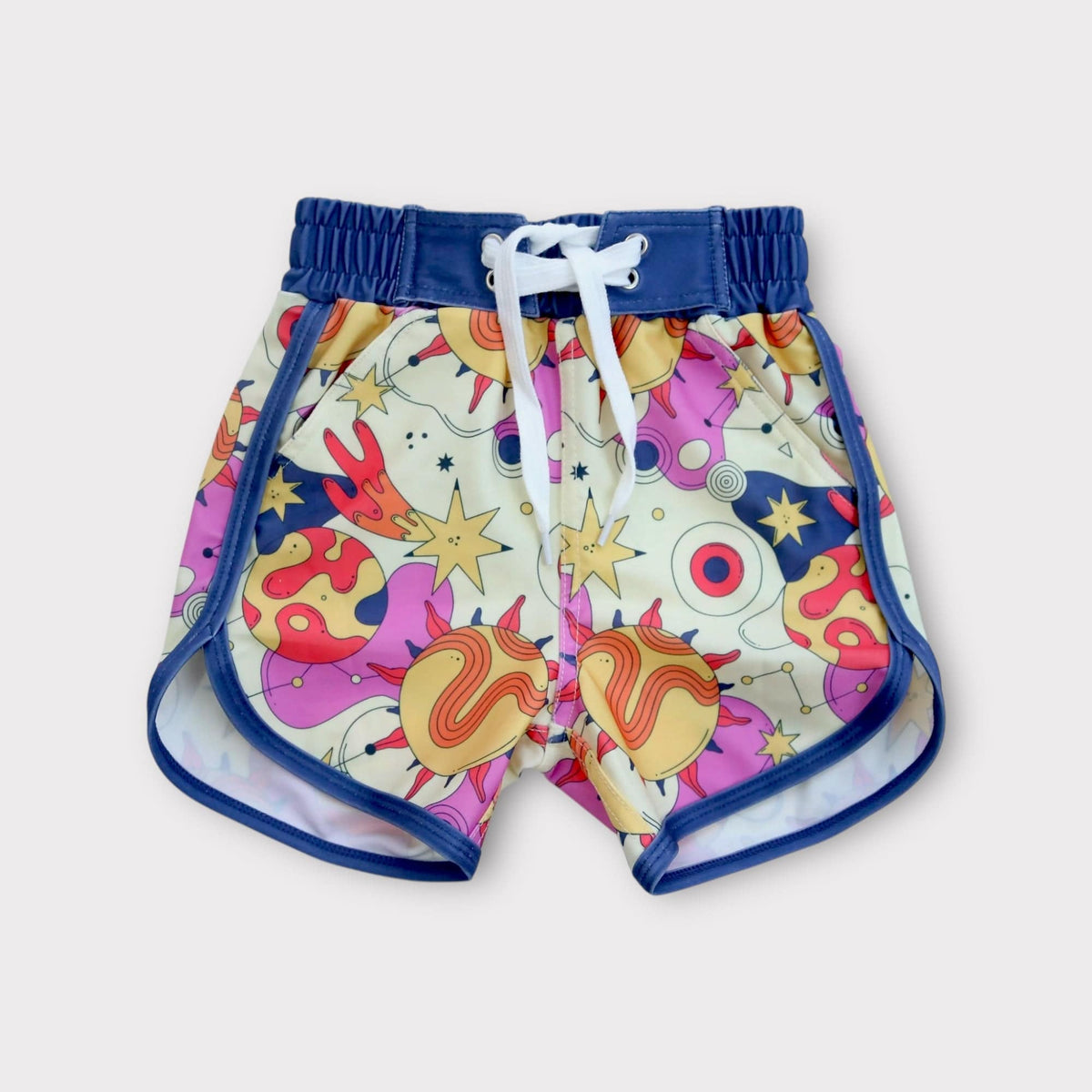 Galactic Groove Board Short, colorful retro cosmic print with navy trim and drawstring