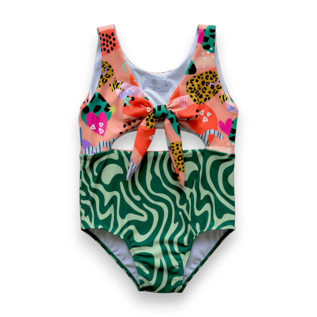 Radical Remix Swimsuit with a Mixed Tape print top, bow and green Trippy Tide bottom