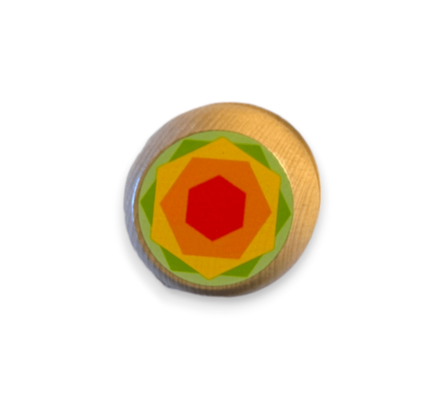 Wooden yo-yo with a red hexagon on orange and green