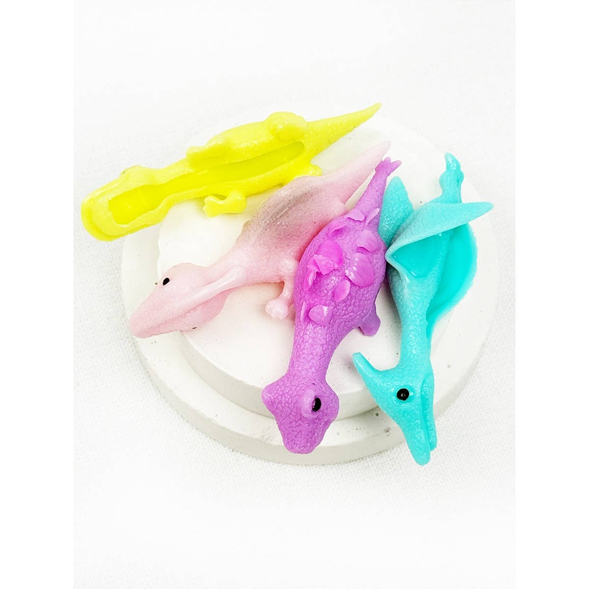 Slingshot dinosaurs piled together
