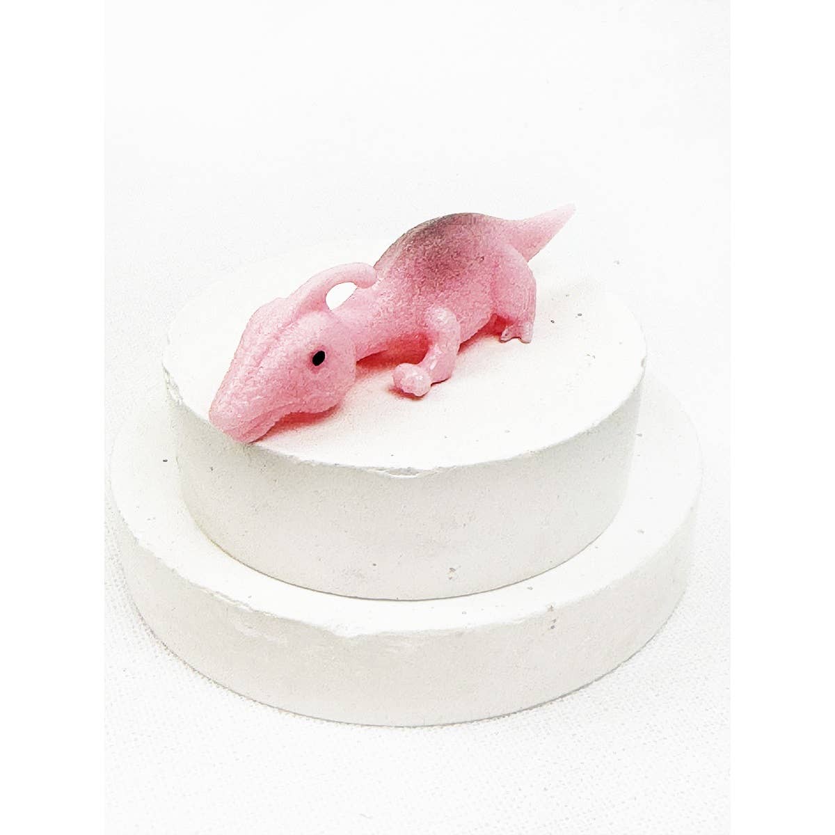 Pink stretchy slingshot dinosaur