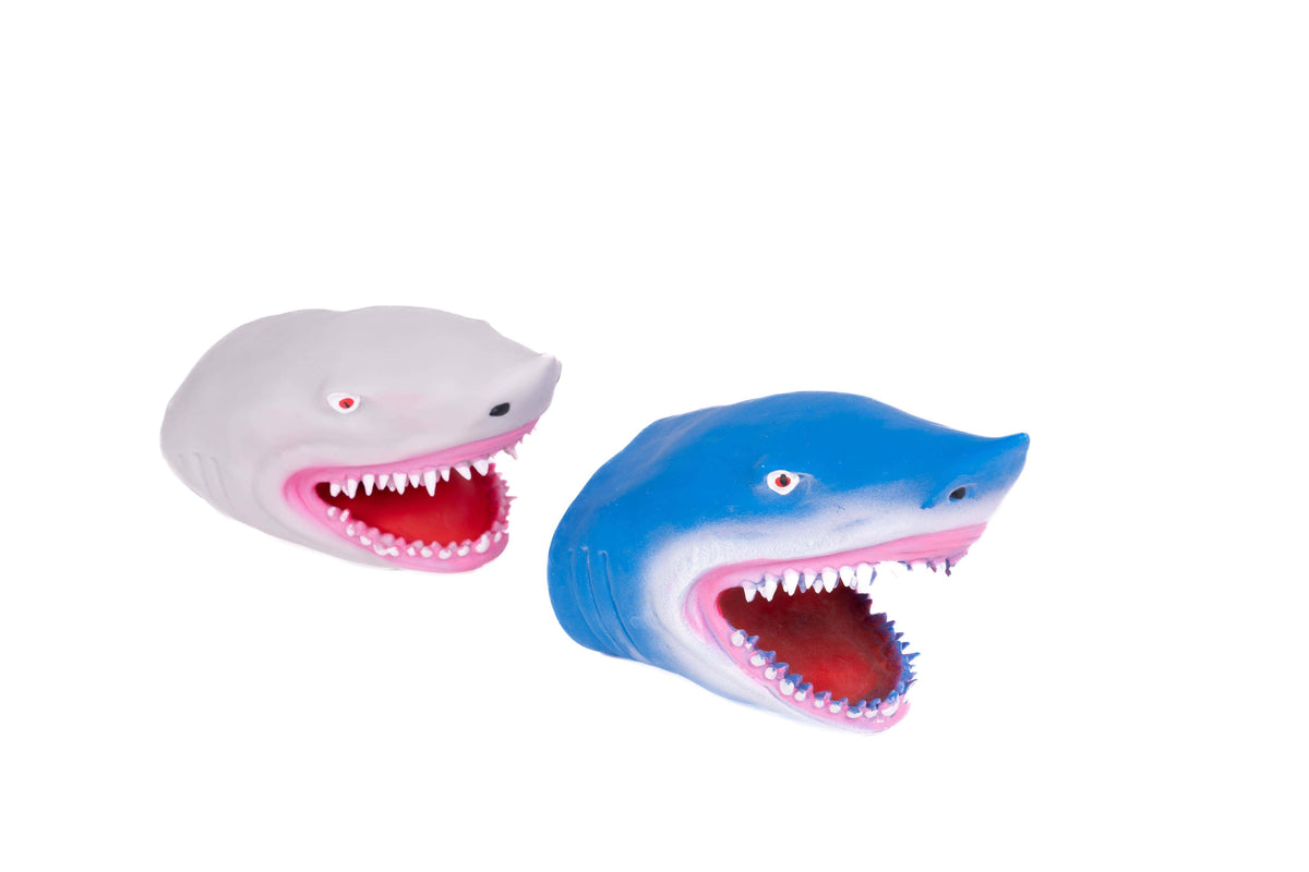 Shark hand puppets lying on their sides